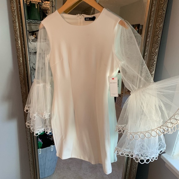 Lulus Dresses & Skirts - White fitted dress with bell sleeve